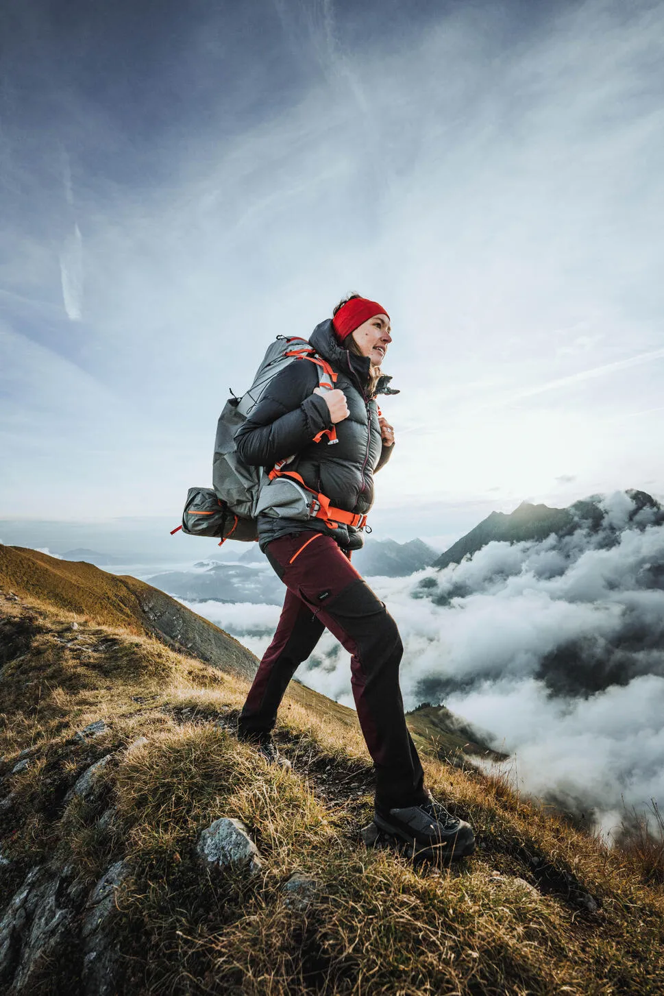 Hiking gear including tents, backpacks, and boots for hiking